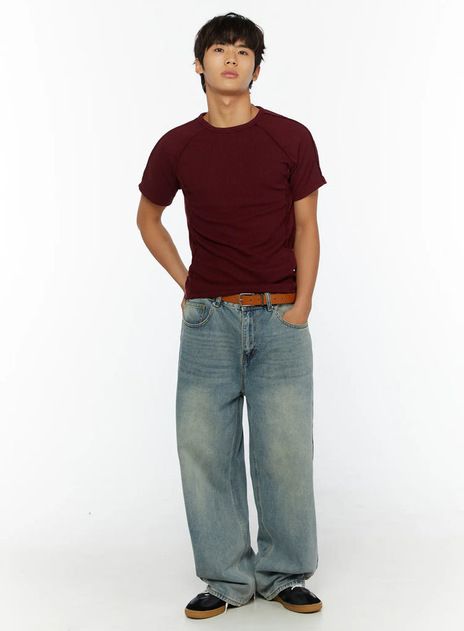 Men's Wide Leg Jeans IL510 light blue full-body front shot on male model styled with burgundy ribbed tee brown belt and black sneakers