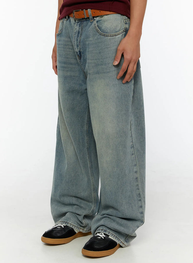 Men's Wide Leg Jeans IL510 light blue side close-up on male model highlighting wide leg silhouette and faded wash denim detail with seam