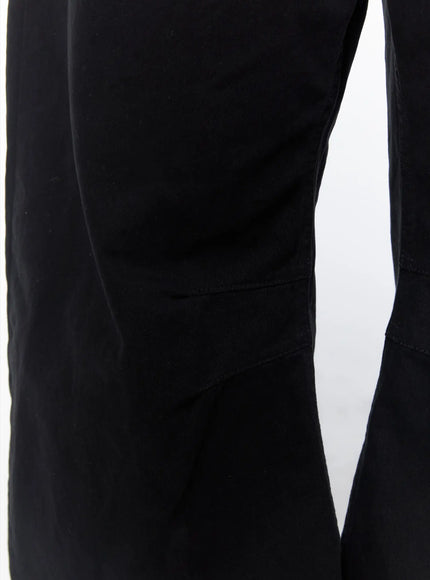 Men's Wide Leg Pants IU523 Black close-up detail of inner leg seam and stitching showing soft cotton fabric texture and balloon-leg structure