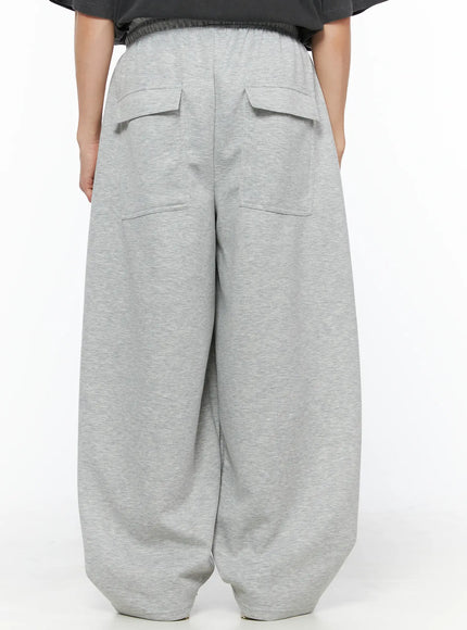 LEWKIN Men's Wide Leg Sweatpants IL510 Gray back shot on model showing dual flap back pockets and dropped crotch balloon silhouette in heathered fleece