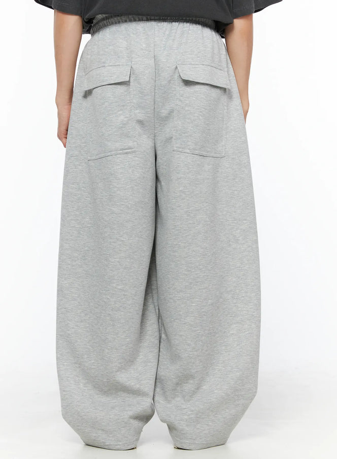 LEWKIN Men's Wide Leg Sweatpants IL510 Gray back shot on model showing dual flap back pockets and dropped crotch balloon silhouette in heathered fleece
