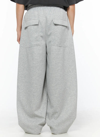 LEWKIN Men's Wide Leg Sweatpants IL510 Gray back shot on model showing dual flap back pockets and dropped crotch balloon silhouette in heathered fleece
