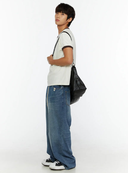 Men's Wide Leg Tie-Detail Jeans IL513 Blue full-body side shot on male model looking over shoulder holding black shoulder bag showing wide leg drape