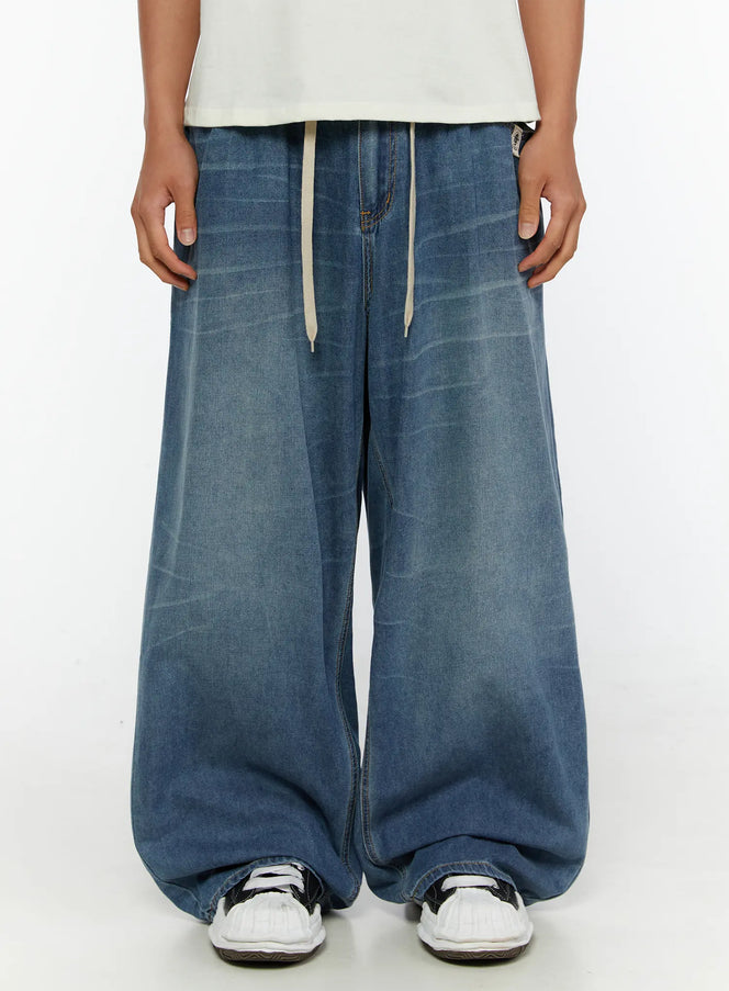 LEWKIN Men's Wide Leg Tie-Detail Jeans IL513 Blue front crop shot on model showing drawstring waist and ultra-wide washed denim legs size M/L
