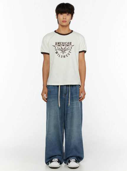 Men's Wide Leg Tie-Detail Jeans IL513 Blue full-body front shot on male model standing straight wearing graphic ringer tee with cream drawstring visible