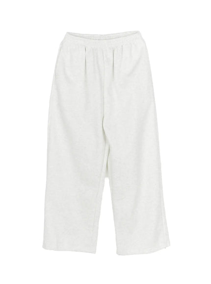 Men's Wide Sweatpants (Light Gray) IL507 Light gray flat-lay front view showing elastic waist, center crease, wide legs, and side slit hem detail