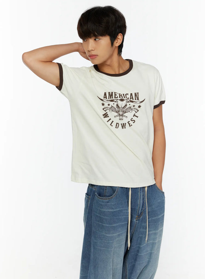 LEWKIN Men's Wild West Graphic T-Shirt IL513 Brown angled front view on male model hand behind head styled with wide-leg blue jeans