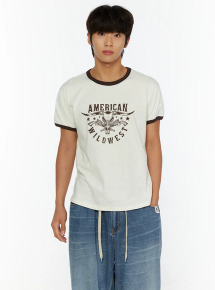 Men's Wild West Graphic T-Shirt IL513 Brown front close-up on male model showing American Wild West bull skull graphic with dark brown ringer trim