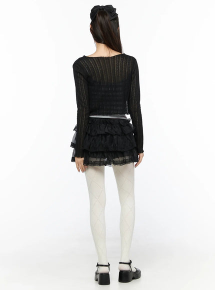 Mesh Tiered Mini Skirt CL522 Black back full-body shot on model revealing back of layered mesh ruffle skirt with sheer organza tiers and lace edge trim