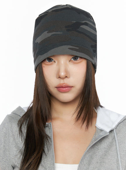 Military Style Beanie IL515 Dark gray front bust shot on model beanie worn straight pulled low waffle-knit camo texture visible with gray zip hoodie