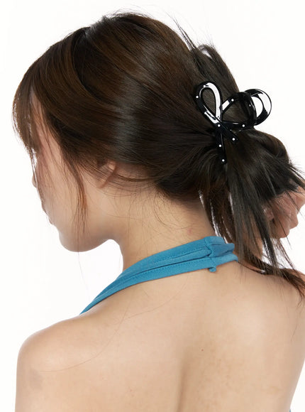Mini Dot Hair Pin IL514 Black on-model back view worn clipping loose updo on brunette model styled with blue halter top