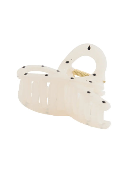 Mini Dot Hair Pin IL514 Ivory bottom-up detail view showing claw teeth structure and gold coil spring hinge with black dots