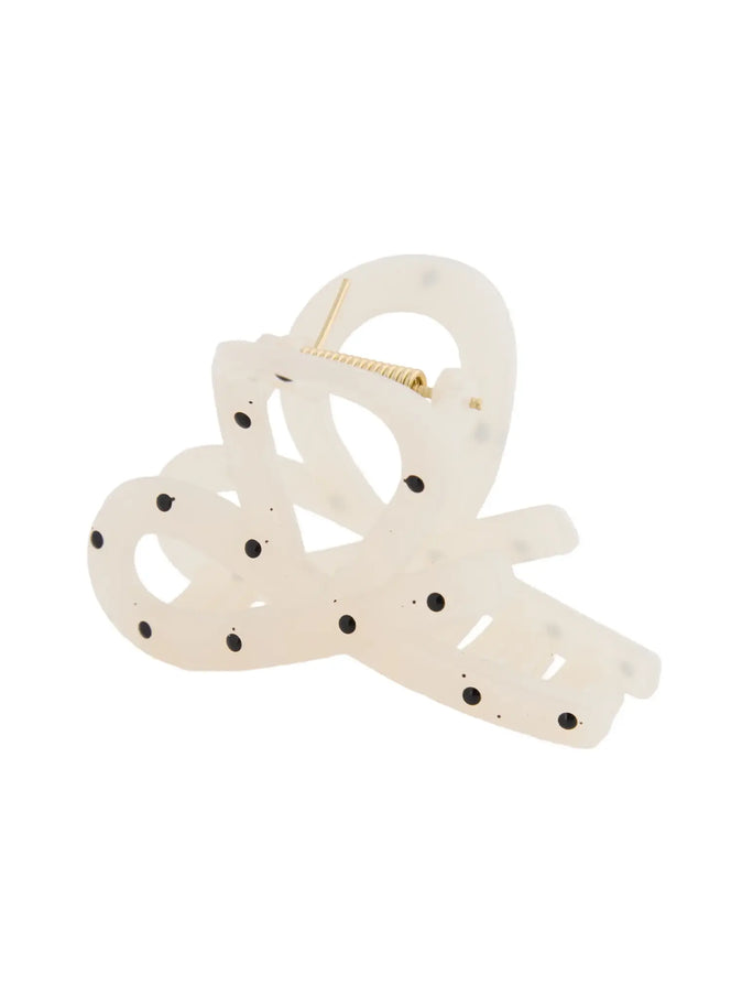 Mini Dot Hair Pin IL514 Ivory angled side view revealing open claw teeth and gold spring mechanism with black dot pattern
