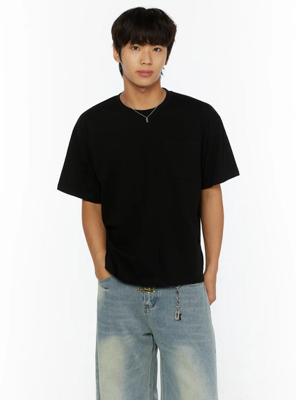 Minimal Tag Necklace IL507 Silver front model shot male model in black t-shirt and wide-leg jeans wearing silver tag necklace hands in pockets