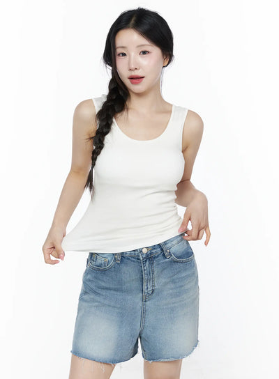 LEWKIN Minimalist Slim-Fit Tank Top IU525 White S/M front view on model with braided hair, fitted scoop neck ribbed tank top styled with denim shorts
