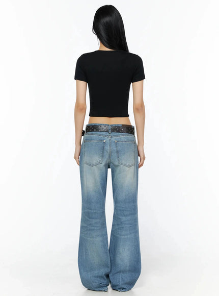 Miri Low Rise Straight Jeans IL509 Blue back view on model in black crop tee showing dual back pockets flared hem and faded wash denim