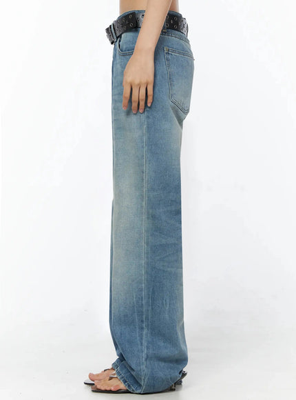 Miri Low Rise Straight Jeans IL509 Blue side view on model showing low-rise fit flared leg line washed texture and black grommet star belt