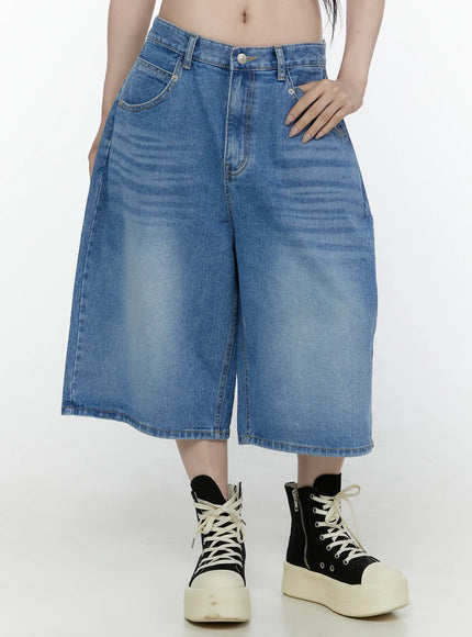 LEWKIN Miu Wide Leg Jeans IL521 Blue front close-up shot on model size S showing washed denim wide-leg silhouette waistband button and front pockets styled with platform sneakers