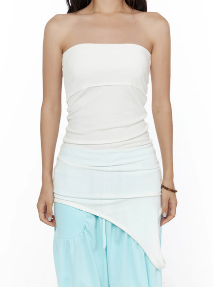 Multifunctional Ruched Sleeveless Top CL513 White cropped front shot on model displaying panelled bodice seam and soft stretch fabric texture with light blue skirt layer below