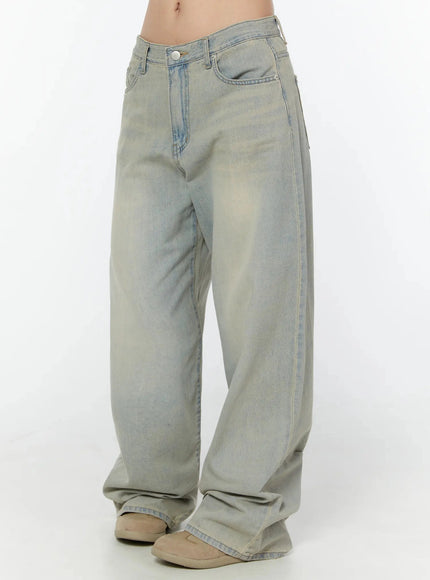 Naia Washed Baggy Jeans IU524 Light blue side shot on model showing full leg length, side seam, back pocket, and extreme wide-leg silhouette pooling at heel