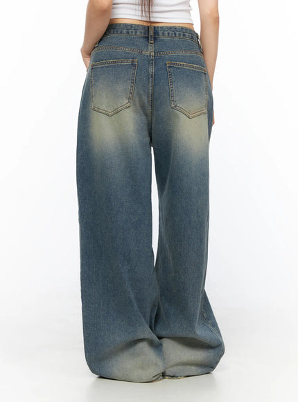 Nayela Vintage Wide Leg Jeans CL517 Blue back shot on model showing double back pockets and yellow-tinted wash on wide leg denim