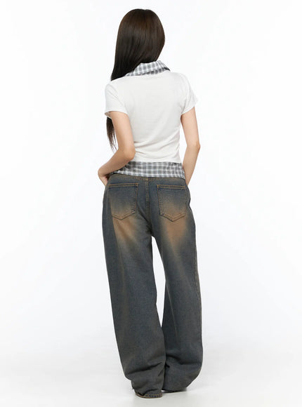 Neya Dark Washed Baggy Jeans CL517 Dark blue full-body back shot on model standing straight showing back pockets brown-tinted wash and draped extra-wide leg hem