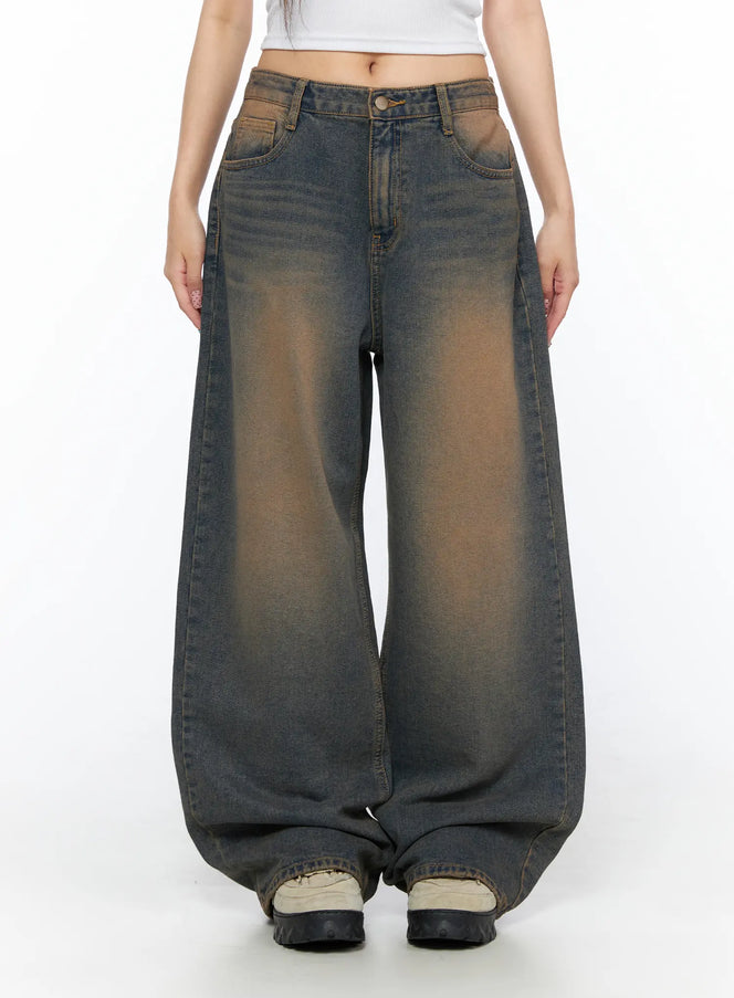 LEWKIN Neya Dark Washed Baggy Jeans CL517 Dark blue front crop shot on model Size S standing straight showing wide-leg silhouette and brown-tinted wash denim