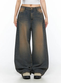 LEWKIN Neya Dark Washed Baggy Jeans CL517 Dark blue front crop shot on model Size S standing straight showing wide-leg silhouette and brown-tinted wash denim