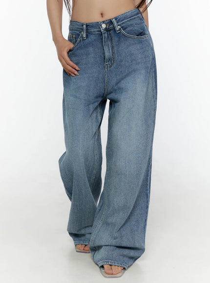 LEWKIN Nixi Wide Leg Jeans CL508 Blue S front close-up on model showing wide-leg silhouette, mid-rise waistband with button closure and faded denim texture