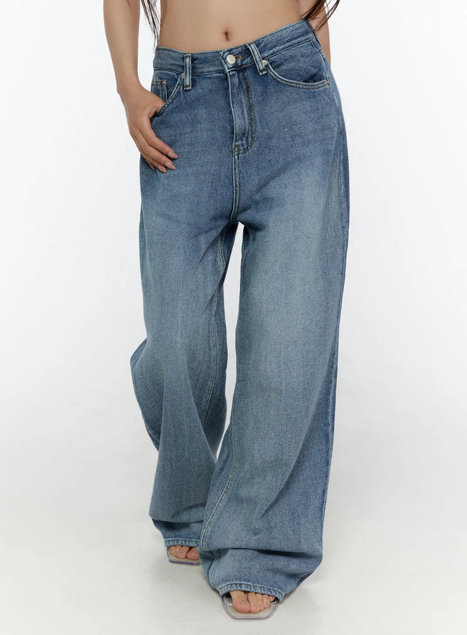 LEWKIN Nixi Wide Leg Jeans CL508 Blue S front close-up on model showing wide-leg silhouette, mid-rise waistband with button closure and faded denim texture