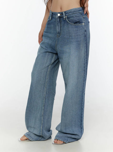 Nixi Wide Leg Jeans CL508 Blue side-angle front shot on model showing wide-leg silhouette from hip to hem with faded wash and slim waist fit