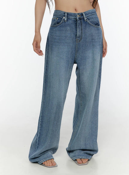 Nixi Wide Leg Jeans CL508 Blue front shot on model showing full-length wide-leg fit with silver-tone button closure and washed blue denim fabric