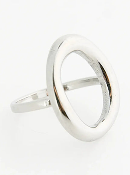 Nova O Ring IL517 Silver side-angle view showing slim band profile and oval hoop top with horizontal bar, polished reflective metal finish
