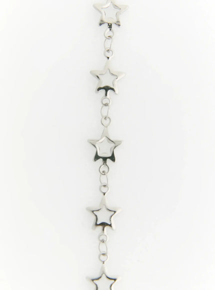Nova Star Necklace IL517 Silver detail close-up of polished open star charms linked by delicate chain rings on white background