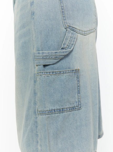 Nyra Low-Rise Jorts CU529 Light blue close-up detail of right-side cargo pocket with belt loop tab and faded wash denim stitching