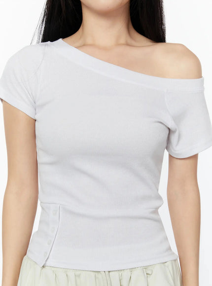 Off-Shoulder Buttoned Slit Tee IU524 White close-up detail shot asymmetric off-shoulder neckline ribbed texture waist slit buttons