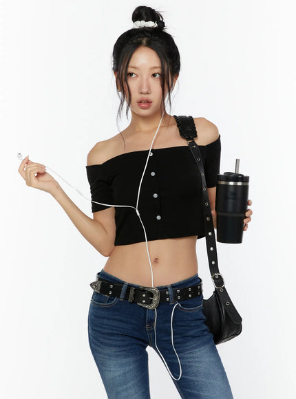 LEWKIN Off-Shoulder Crop Top CU529 Black size S front model shot three-quarter pose with accessory styling, ribbed knit crop top with silver buttons