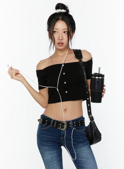 LEWKIN Off-Shoulder Crop Top CU529 Black size S front model shot three-quarter pose with accessory styling, ribbed knit crop top with silver buttons