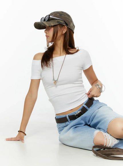 LEWKIN Off-Shoulder Fitted Top CL515 White S/M front model seated on floor wearing camo cap and ripped jeans ribbed crop fit