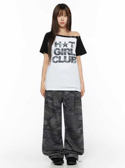 Off-Shoulder Graphic Print Top IL523 White full-length front shot on model standing neutral pose black raglan contrast sleeves star stud neckline camo wide-leg pants