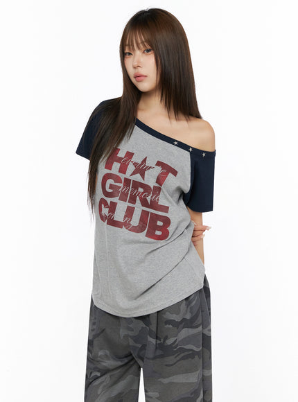 Off-Shoulder Graphic Print Top IL523 Gray side-front shot on model with navy raglan sleeves red HOT GIRL CLUB print and star stud neckline detail