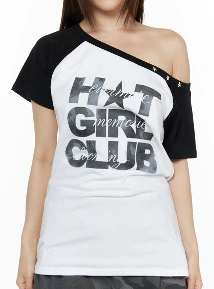 Off-Shoulder Graphic Print Top IL523 White close-up front detail shot showing HOT GIRL CLUB graphic print asymmetric off-shoulder neckline with silver star studs
