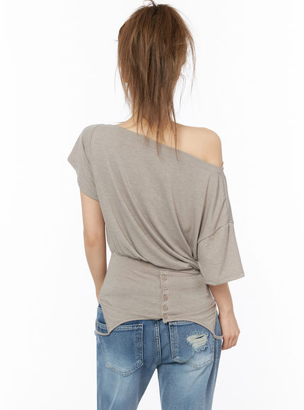 Off-Shoulder Two-Way Cami Top IU525 Beige back shot on model showing row of back buttons curved split hem and soft jersey drape at waist