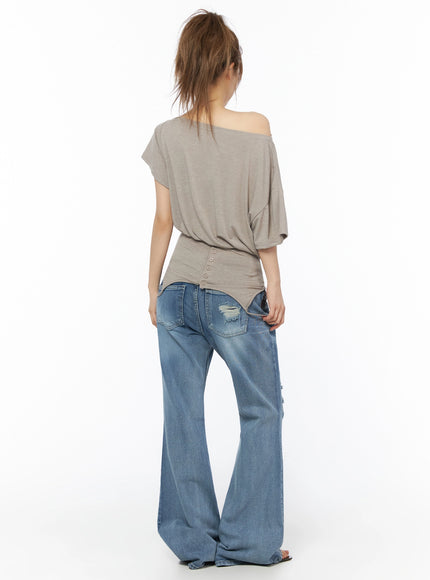Off-Shoulder Two-Way Cami Top IU525 Beige back full-body shot on model showing back button placket asymmetric curved hem and soft jersey drape