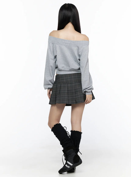 Off-Shoulder Zip-Up Cardigan CL527 Gray back shot on model showing clean off-shoulder back panel and dropped sleeves, styled with plaid mini skirt and black boots