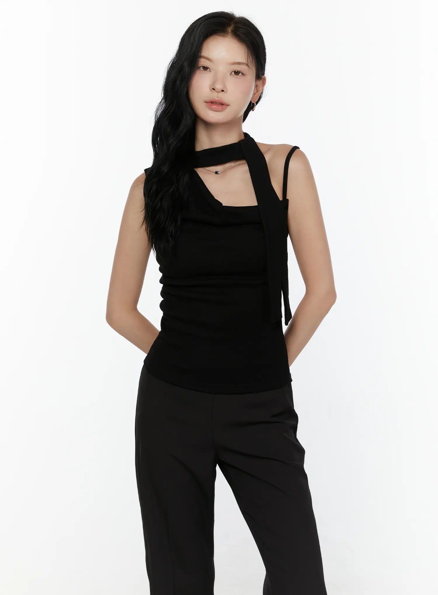One-Shoulder Bow Top CL521 Black front model half-body shot with tie strap across neck hands behind back square neckline ruched knit top