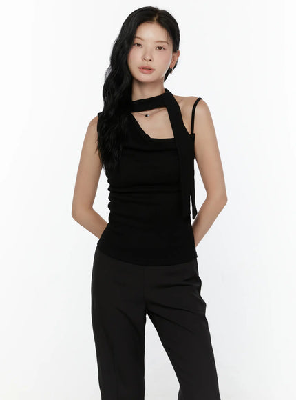 One-Shoulder Bow Top CL521 Black front model half-body shot with tie strap across neck hands behind back square neckline ruched knit top
