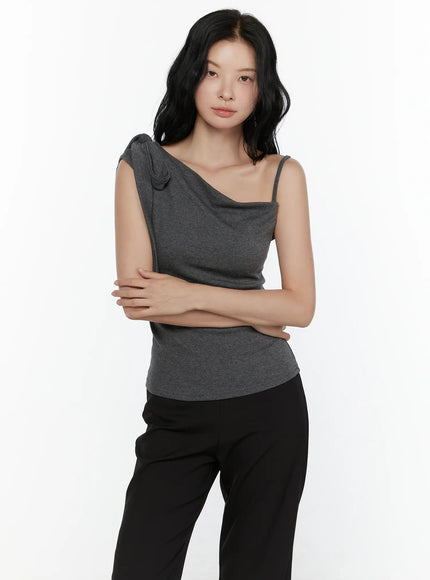 One-Shoulder Bow Top CL521 Dark gray front model half-body shot arms crossed showing compact bow strap and form-fitting heathered knit slightly different angle