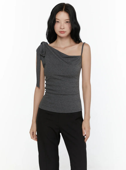 One-Shoulder Bow Top CL521 Dark gray front model waist-up shot showcasing asymmetric neckline drape and bow detail on left shoulder