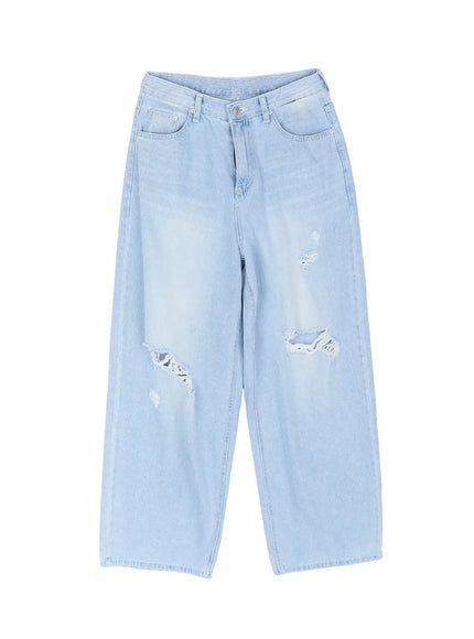 Ophelia Distressed Baggy Jeans IL502 Light blue flat-lay front view showing full wide-leg silhouette button fly and multiple distressed rips across both legs